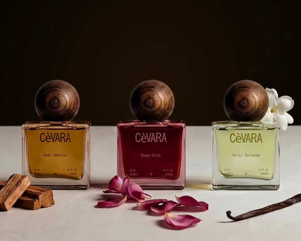 Three CèVARA perfume bottles with wooden caps