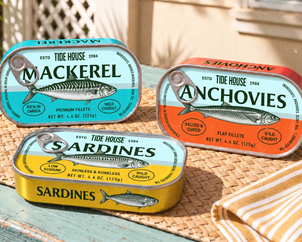 Tide House mackerel, anchovy and sardine tins on a table